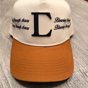 Civil regime hat “blooming through chaos”Stylish Beige and Black Cap with Script